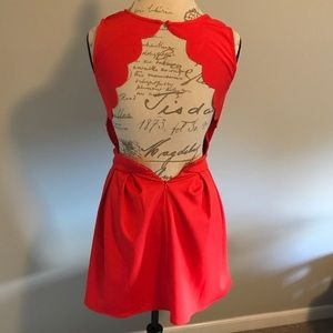 Open back orange mini dress